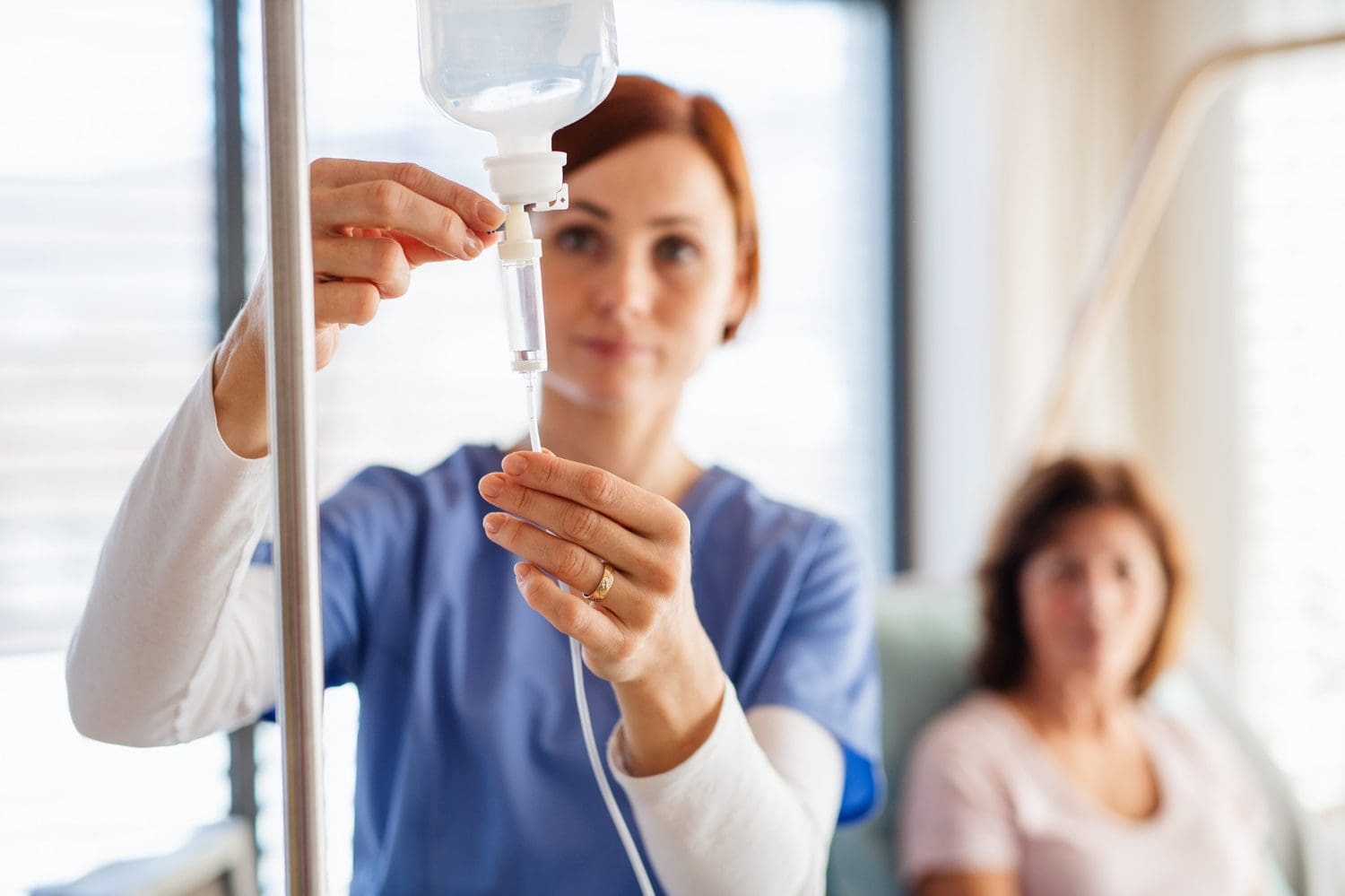 neuronet-gpo-nurse-preparing-iv-infusion